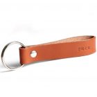 FUCK. Against bad vibes Pflanzlich gegerbtes Lederschlüsselband mit Wortprägung